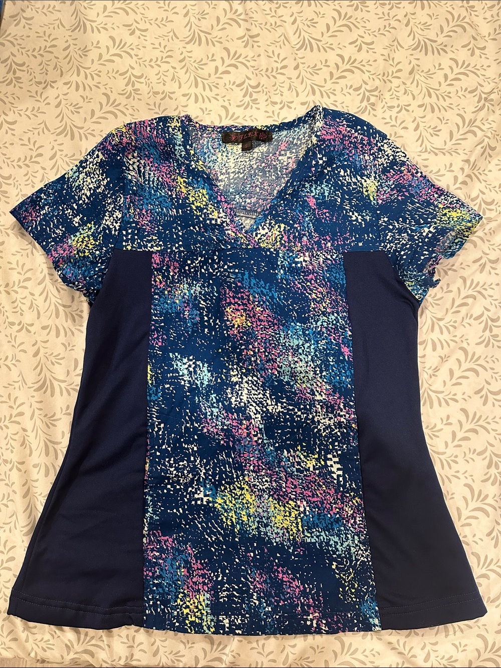 V-Neck Short Sleeve scrub top in Navy with Multicolor Abstract Print